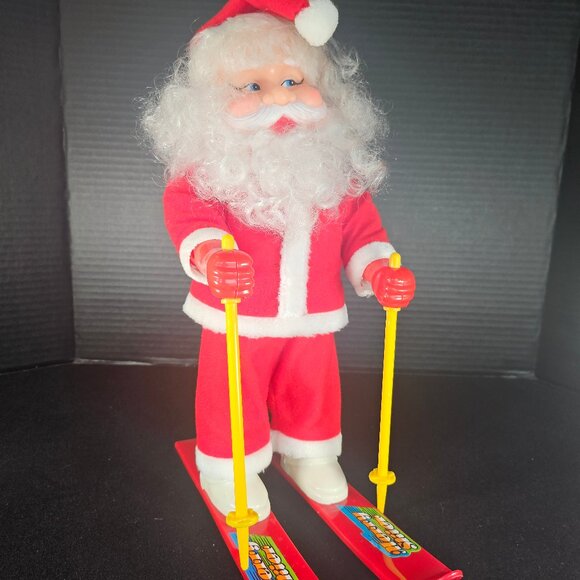 Vintage Musical Merry Skier Santa Claus On Skis Rolls Around & Plays Jingle Bell - Picture 1 of 10